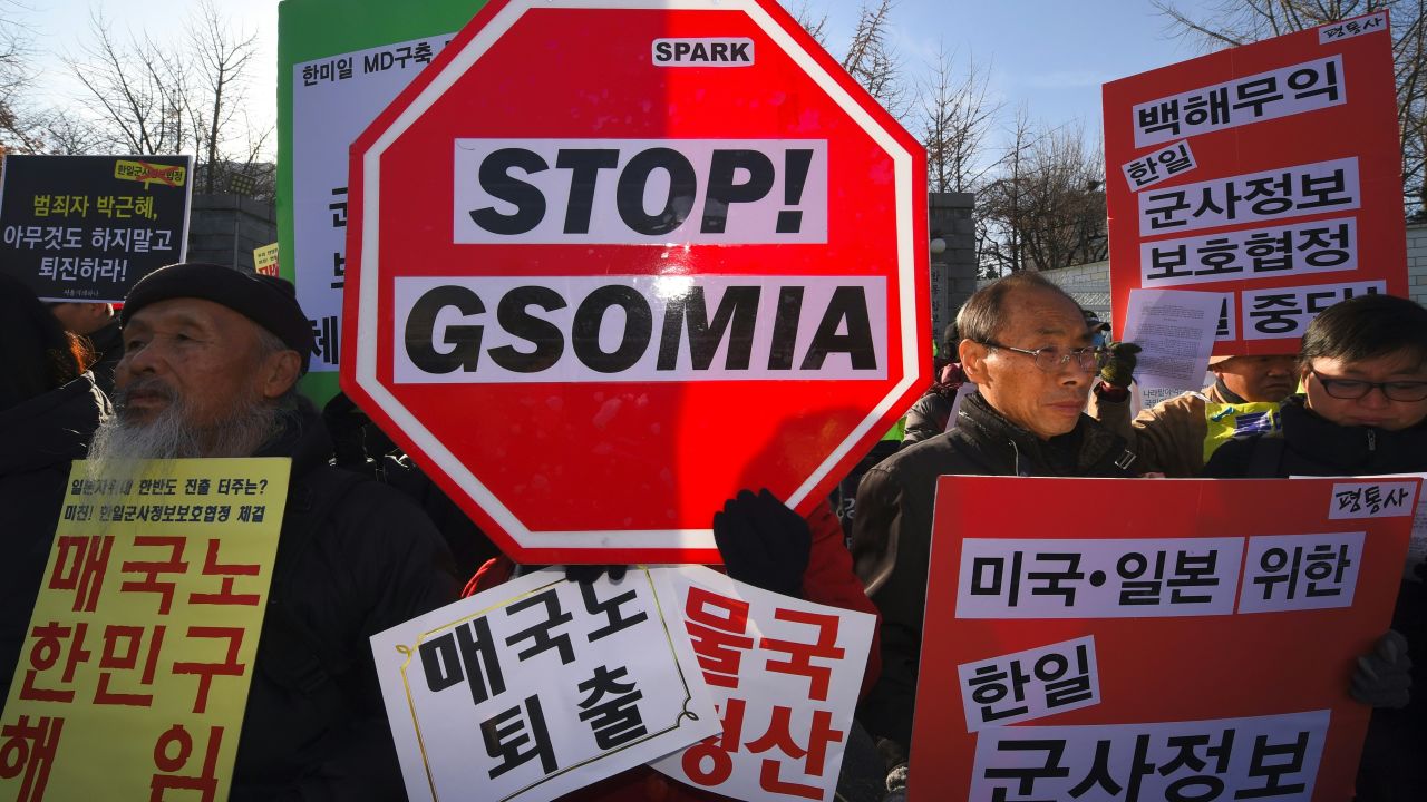 South Korean protesters hold a rally Wednesday in Seoul against the signing of a military agreement with Japan.