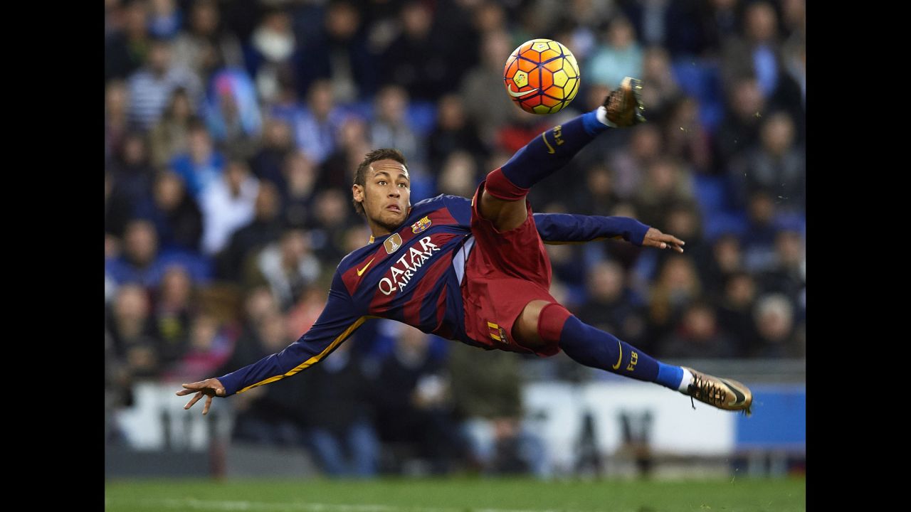 Neymar, a forward for FC Barcelona, concentrates on the ball during a Spanish league match against city rivals Espanyol on Saturday, January 2.