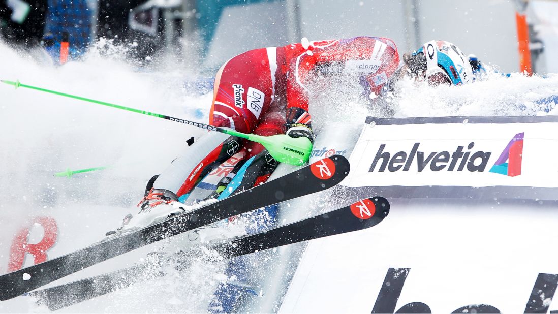 Norwegian skier Henrik Kristoffersen crashes in the arrival area after winning the World Cup slalom race in Wengen, Switzerland, on Sunday, January 17.