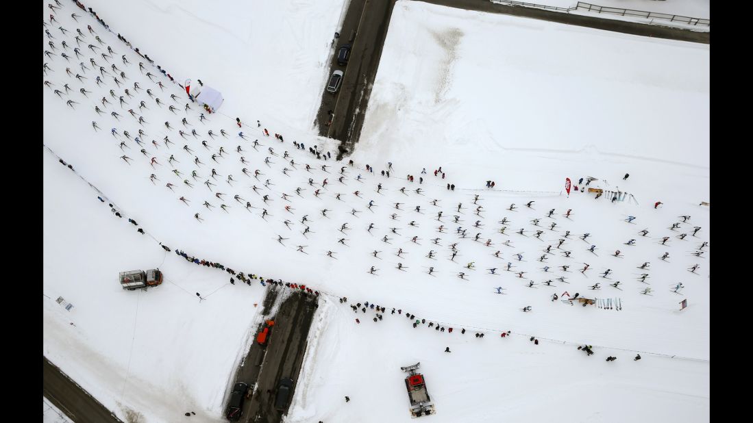 Thousands of cross-country skiers race near the village of Sils, Switzerland, as they participate in the annual Engadin Ski Marathon on Sunday, March 13.