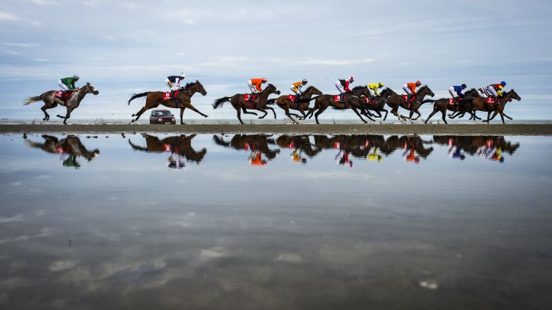 Horses race in Laytown, Ireland, on Tuesday, September 13.