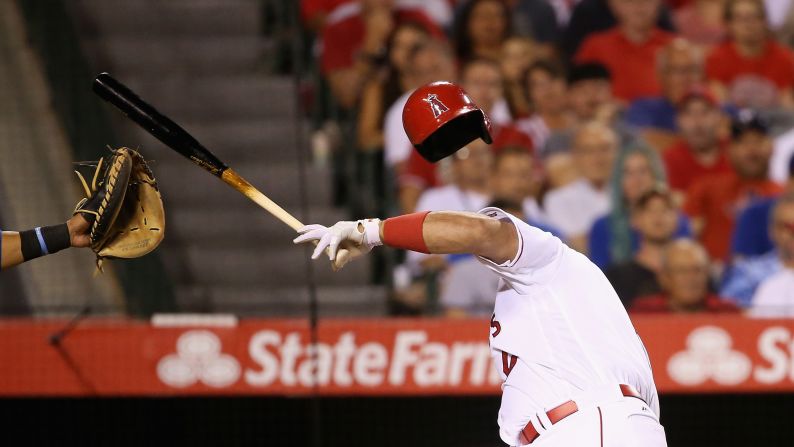 Albert Pujols' helmet goes flying after he was hit in the head by a Tony Barnette pitch on Tuesday, July 19. The Angels star recovered quickly and stayed in the game.