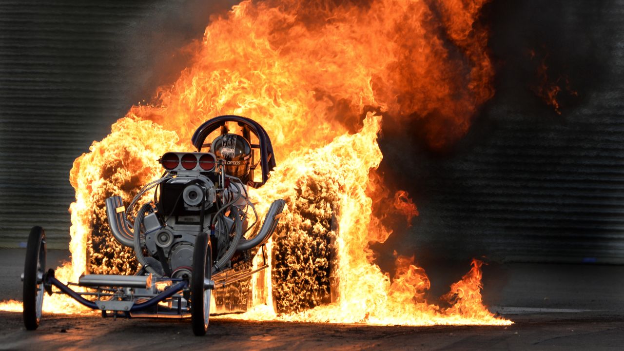 Bob Hawkins performs a flaming burnout during the Dragstalgia event in Wellingborough, England, on Saturday, July 16.