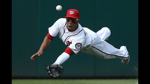 Washington outfielder Ben Revere tries to make a diving catch during a Major League Baseball game on Wednesday, June 15.
