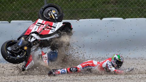 MotoGP rider Danilo Petrucci crashes Sunday, June 5, at the Catalunya Grand Prix in Barcelona, Spain. He finished the race in ninth.