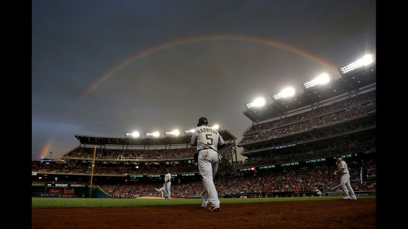 A rainbow appears over Nationals Park during a Major League Baseball game in Washington on Saturday, July 16.