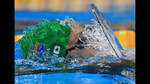 South African swimmer Christopher Reid competes in the 100-meter backstroke during the Olympic Games on Sunday, August 7.