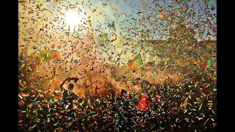 Fans in Lisbon, Portugal, celebrate after <a href="index.php?page=&url=http%3A%2F%2Fwww.cnn.com%2F2016%2F07%2F10%2Ffootball%2Ffrance-portugal-euro-2016-final%2Findex.html" target="_blank">Portugal defeated France</a> in the final of Euro 2016 on Sunday, July 10. It was the soccer team's first major title.