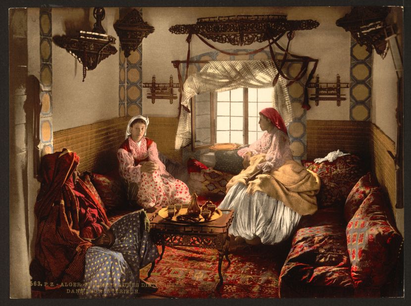 The label on this photochrom describes the subjects as "Distinguished Moorish women" in Algiers. Who does and doesn't appear in these images is an important discussion point, says Charlotte Chopin, expert on colonial Algeria.