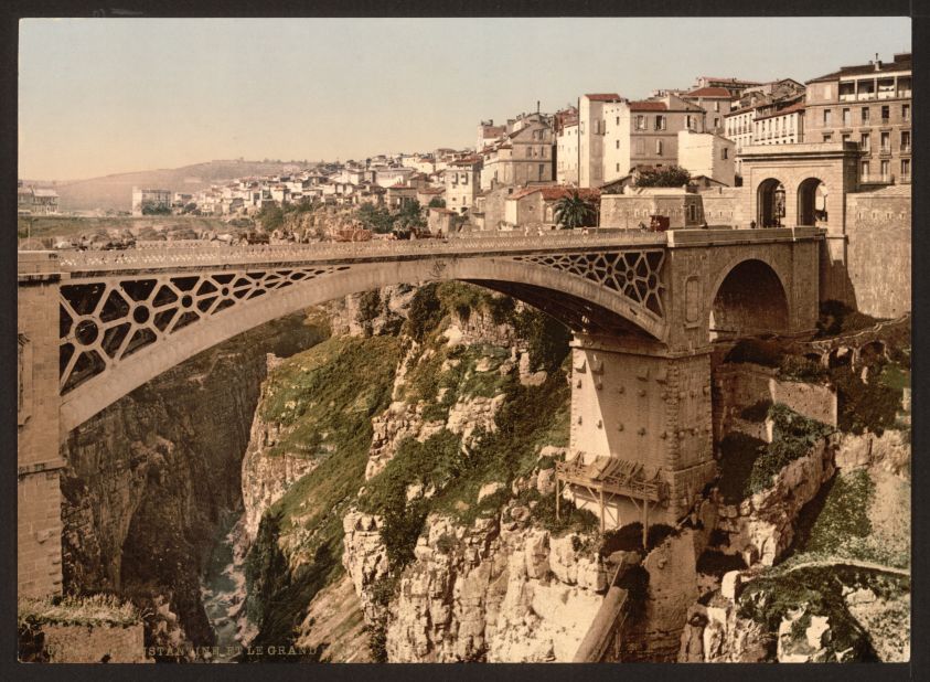 Bridge in Constantine, Algeria. The photochrom process, invented 1890, was soon patented by companies around Europe and the US. It's thought most of the photochroms from this period in North Africa were taken by Europeans, although many authors are unknown today.