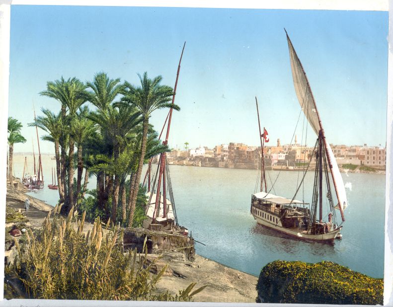Sailboat on the River Nile, Cairo, Egypt. The era of the photochrom coincided with an era of great expansion within the travel industry. It became easier to cross oceans and tour other continents, and Europeans often visited North Africa to escape the pollution of cities across the Mediterranean Sea.