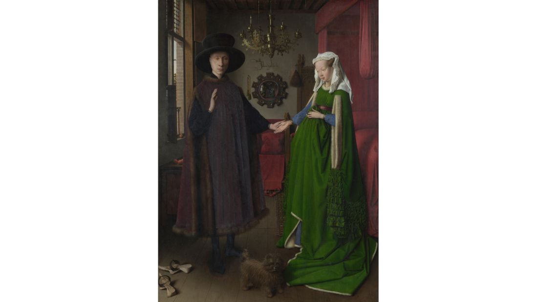 The ornate Latin script above the mirror in the background is not an ancient expression. It's merely a cheeky translation of "Jan van Eyck was here 1434." 