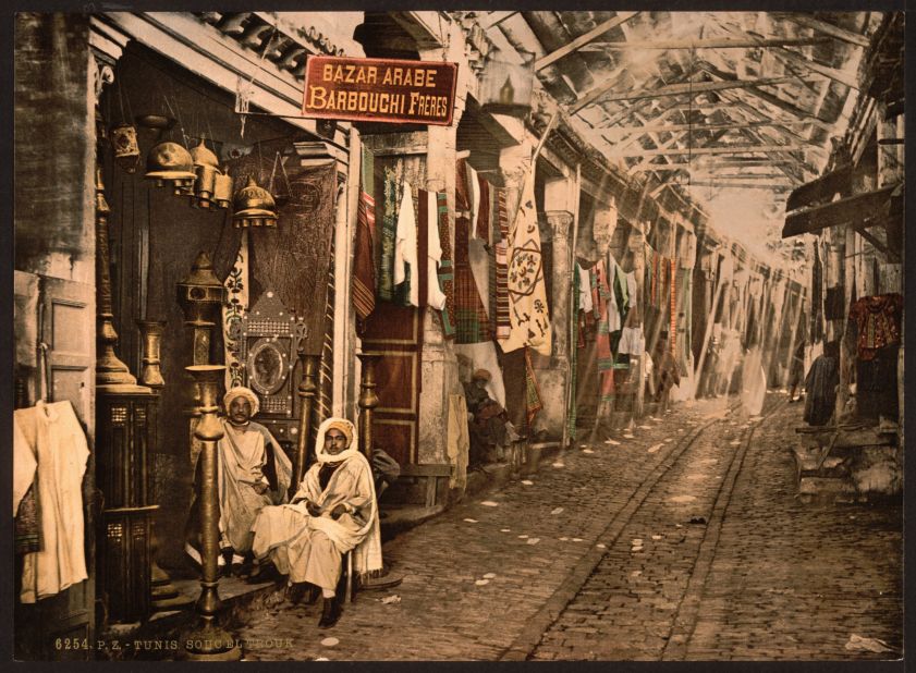 The Souc-el-Trouk, Tunis. Together, these images amount largely to an Orientalized, exotic version of North Africa appealing to tourists and travelers.  