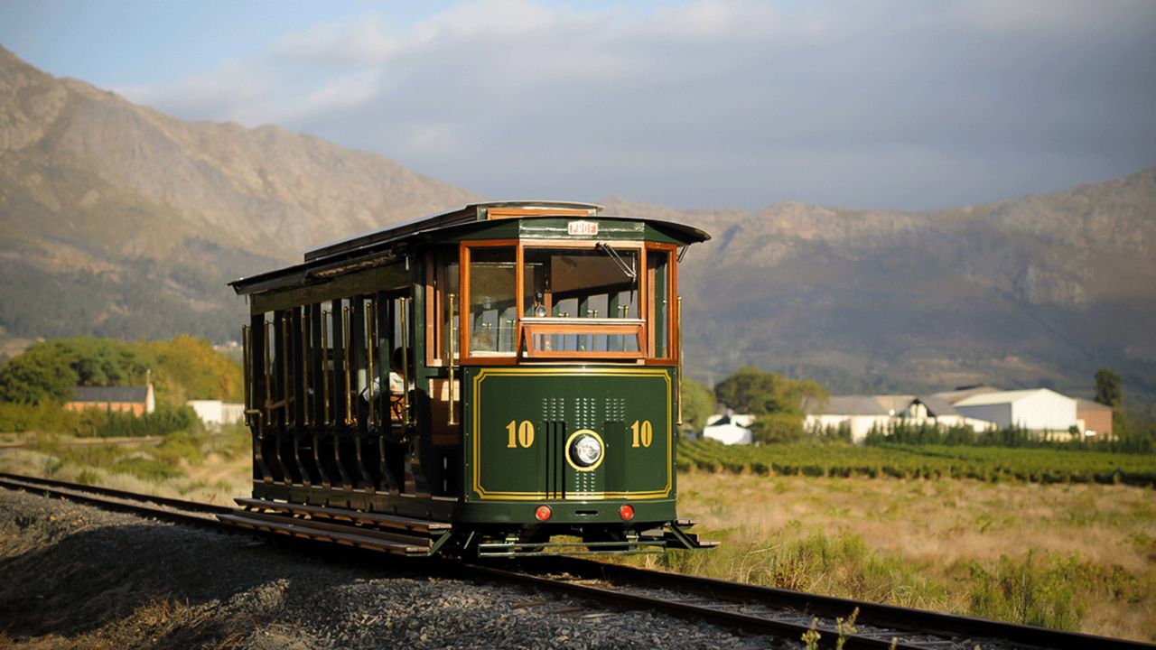 One of the South Africa's best wine experiences is the Wine Tram in Cape Province's Franschhoek are. It makes use of a narrow-gauge track around the vineyards originally built for transporting fruit. Enterprising operator David Blyth has revived it for use by wine connoisseurs.