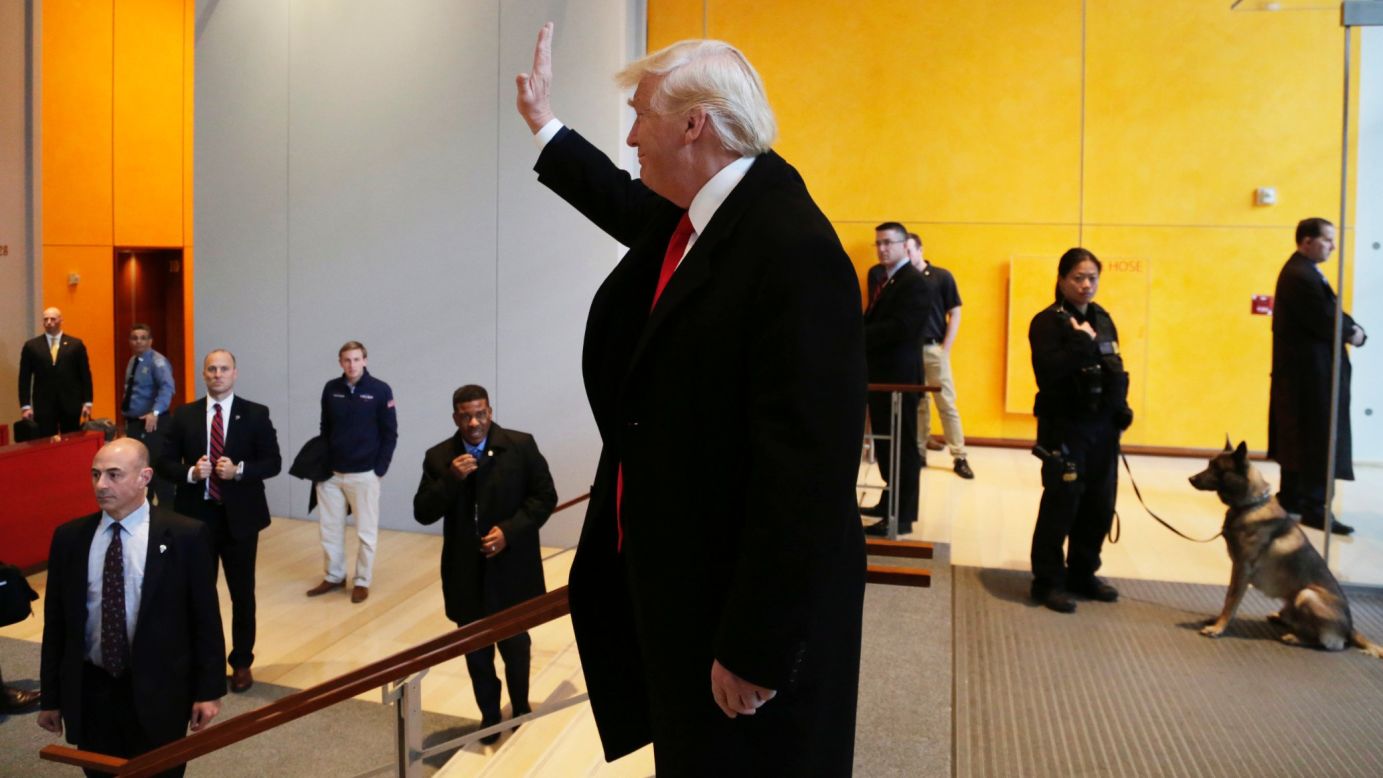 US President-elect Donald Trump waves to a crowd at The New York Times building after meeting with some of the newspaper's reporters, editors and columnists on Tuesday, November 22. <a href="http://www.cnn.com/2016/11/22/politics/takeaways-donald-trump-new-york-times-meeting/" target="_blank">Six takeaways from the meeting</a>