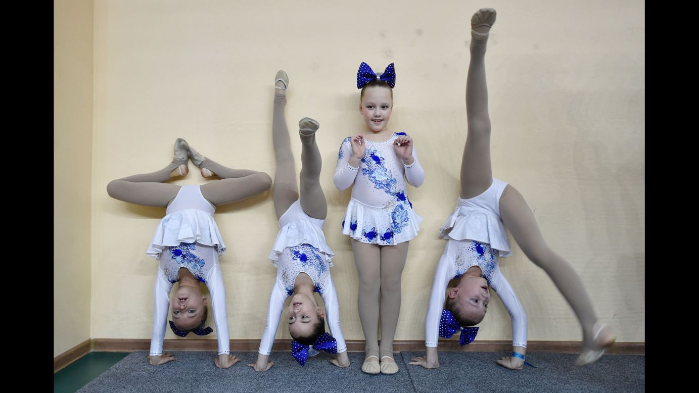 Young cheerleaders warm up at the Russian Cheerleading Championship in Moscow on Sunday, November 20.