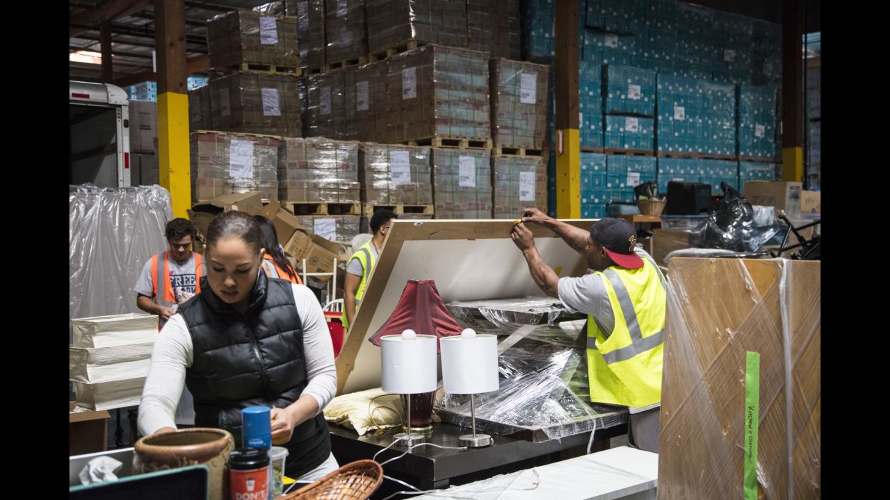 Out of this donated warehouse space in Carson, California, Smith and her team organize gifted household items that will be given to former wards of the state who may not have families to help them establish a home of their own.