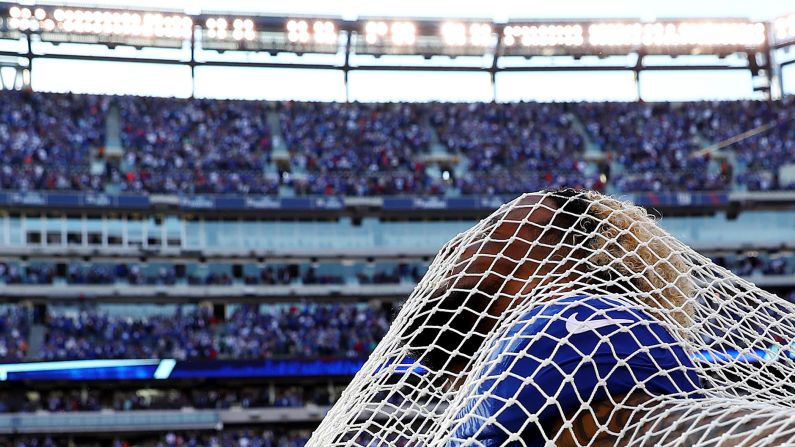 New York Giants wide receiver Odell Beckham sticks his head through a sideline kicking net after scoring the go-ahead touchdown against Baltimore on Sunday, October 16. Beckham and the net have had <a href="index.php?page=&url=http%3A%2F%2Fnypost.com%2F2016%2F10%2F16%2Fodell-beckham-takes-the-plunge-with-kicking-net%2F" target="_blank" target="_blank">an interesting relationship,</a> to say the least. Beckham attacked the net in anger three weeks before this, and then a couple of games later he hugged the net to "make up." This time around, he even got on one knee in a mock proposal.