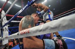 Cruz slumps against the ropes after a knockout punch from Salido.