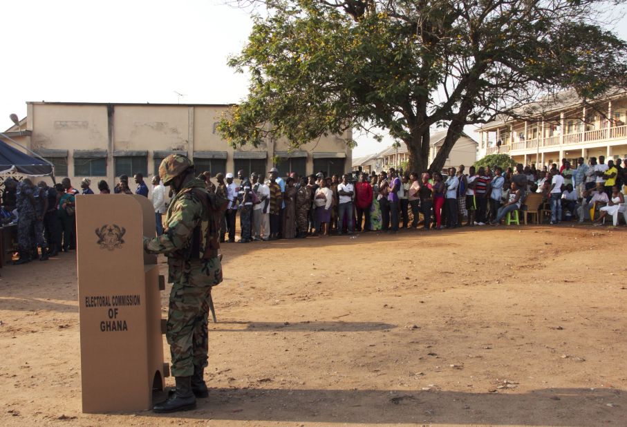 Just over half of Ghanaians believe political parties and/or candidates are likely to use violence in the upcoming  elections.<br /><br />Pictured: A soldier casts his ballot at a polling station as other voters wait in line, in Accra, on December 7, 2012, during national elections. Photo Chris Stein/AFP/Getty Images.