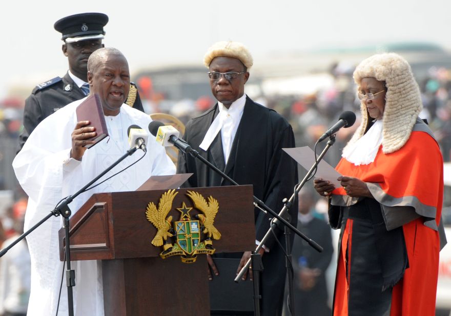 The election is expected to be tight between the ruling National Democratic Congress (NDC) and the largest opposition, New Patriotic Party (NPP). Ghana's current president, John Dramani Mahama, in office since 2012, is seeking re-election.<br /> <br />Pictured: President Mahama takes an oath of office at Independence Square, in Accra, January 2013.<em> </em>Photo Pius Utomi Ekpei/AFP/Getty Images.
