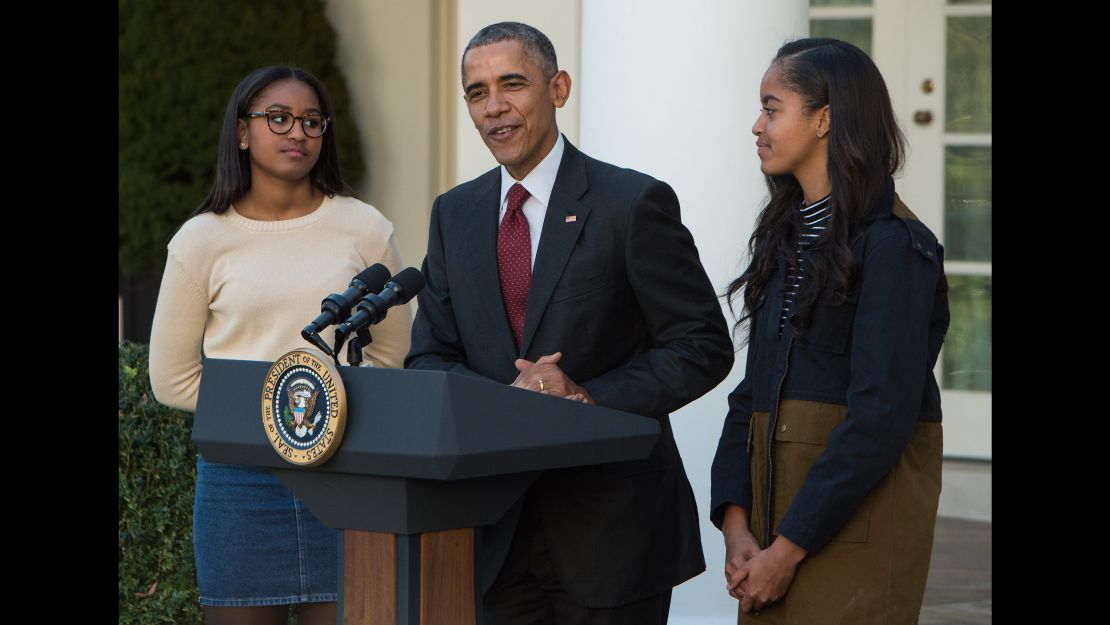 Sasha (left) and Malia Obama at the 2015 turkey pardon. You can just hear their inner groans.