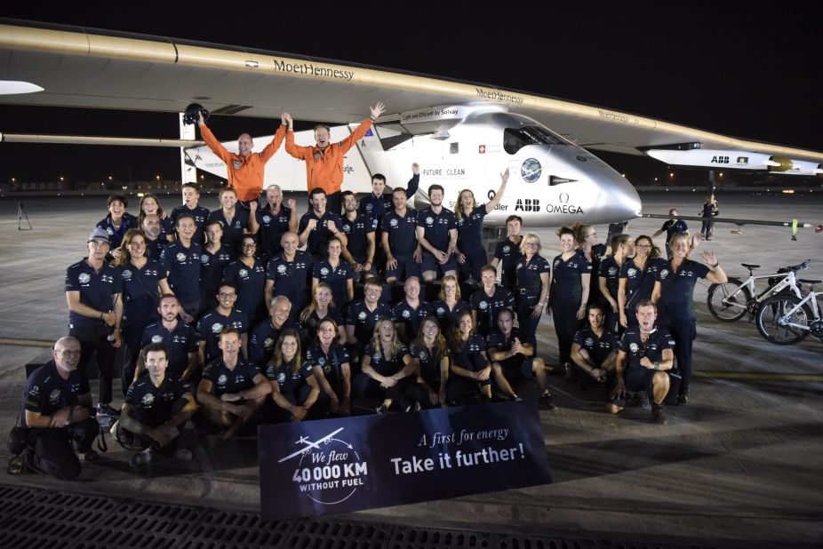 The whole crew celebrate in Abu Dhabi after the landing.