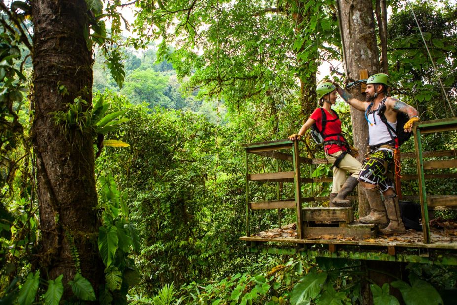"I used to commute two hours each way in and out of the city in Baltimore and wear a suit everyday and that was very telling as to why I now live in the middle of the rainforest because it drove me crazy," says Hogan. Pictured here, Erica and Matt take a break from ziplining in the rainforest.<br />