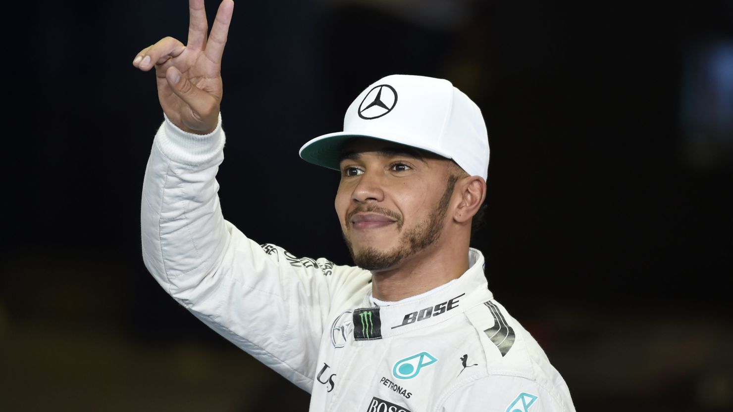 Lewis Hamilton is all smiles after taking pole position for the Abu Dhabi GP at Yas Marina.