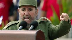 Habana, CUBA:  Cuban President Fidel Castro presides over a massive May Day demonstration at Havana's Plaza de la Revolucion (Revolution Square), 01 May 2005. A spokesman of Cuban President Fidel Castro read on Cuban National TV a document signed by Castro, 31 July 2006, by which he delegates power to his brother Raul Castro. Fidel Castro underwent surgery shortly after coming back from Mercosur?s Summit in Cordoba, Argentina. "I do delegate, provisionally, my duties as first secretary of the Central Committee of the Communist Party in Cuba, to the second secretary, comrade Raul Castro Ruz," Castro said. AFP PHOTO/Adalberto ROQUE  (Photo credit should read ADALBERTO ROQUE/AFP/Getty Images)