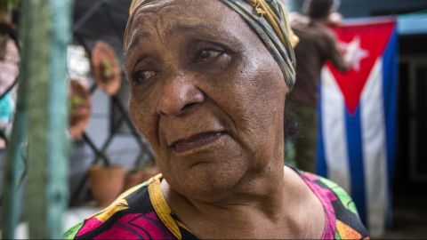 Rafaela Vargas mourns the death of former President Fidel Castro at the entrance of her home in the Vedado neighborhood in Havana, Cuba, on Saturday, November 26. 
