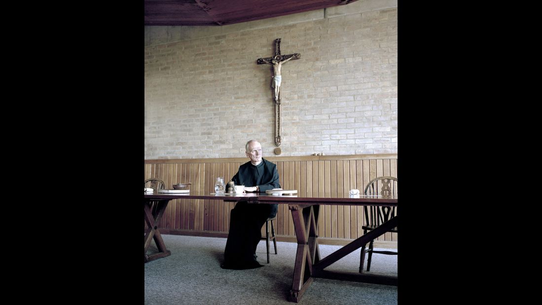 Father Leo pauses in Downside Abbey. Bourne shot entirely on film, and he said he had to use a tripod often because the monasteries can be quite dark.