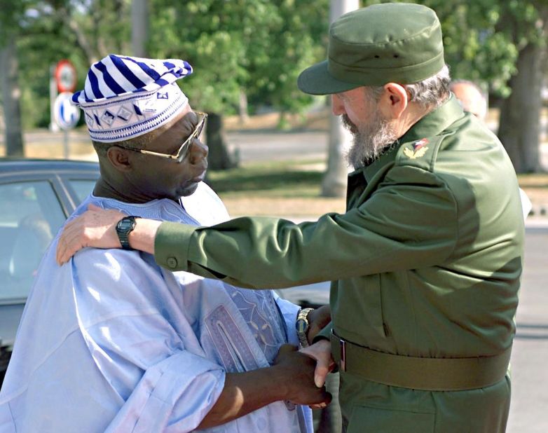 Former Nigerian President Olusegun Obasanjo is greeted by Castro at the Plaza de la Revolucion in Havana, April 10, 2000
