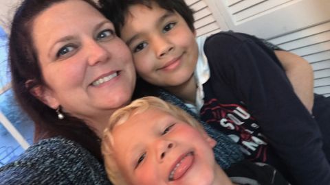 Heather Rosenberg with her sons Liam and Warren. Their mothers were substance abusers, and the children suffer from developmental delays. 