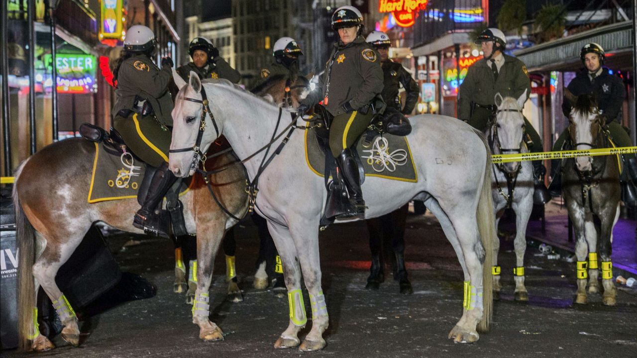 A mounted sheriff's patrol blocks off a crime scene after Sunday's fatal shooting.