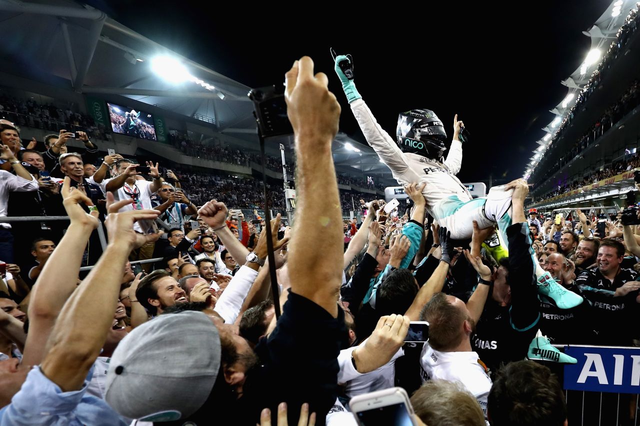 The moment of triumph: Nico Rosberg finishes second behind Lewis Hamilton in Abu Dhabi to secure a first world title -- 34 years after his dad, Keke, won his. 