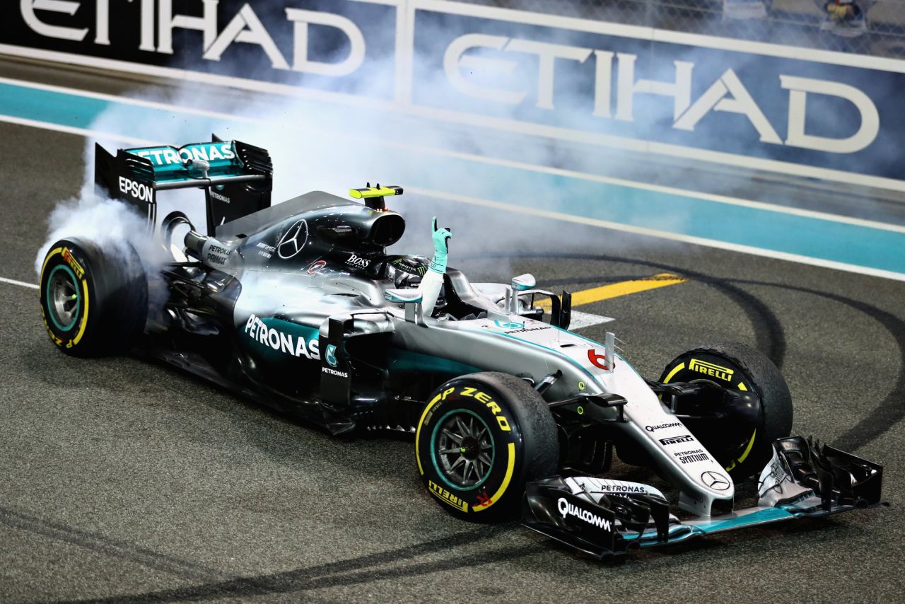 Rosberg celebrates after the Abu Dhabi Grand Prix in customary style, after asking his team permission to do wheelspins.