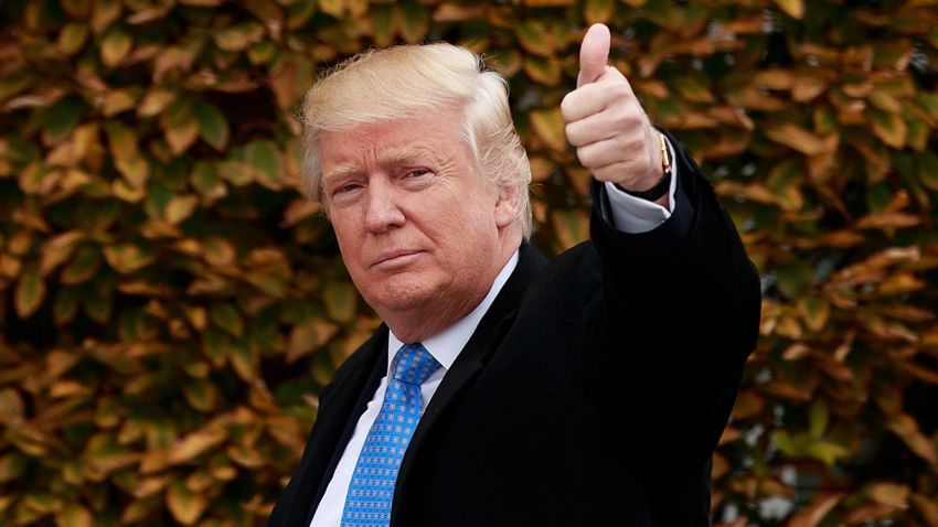 BEDMINSTER TOWNSHIP, NJ - NOVEMBER 20: President-elect Donald Trump waves as he arrives at Trump International Golf Club for a day of meetings, November 20, 2016 in Bedminster Township, New Jersey. Trump and his transition team are in the process of filling cabinet and other high level positions for the new administration.  (Photo by Drew Angerer/Getty Images)