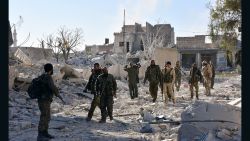 Syrian pro-government forces inspect an area on November 27, 2016 in the Masaken Hanano district in eastern Aleppo, a day after they resized it from rebel fighters.
Syria regime forces seized two new rebel-held districts in Aleppo a day after they retook the largest opposition-controlled neighbourhood in the second city, a monitor said. The capture of Masaken Hanano -- which had been the biggest rebel-held district of Aleppo -- was a major breakthrough in a 13-day regime offensive to retake the entire city. / AFP / GEORGE OURFALIAN        (Photo credit should read GEORGE OURFALIAN/AFP/Getty Images)