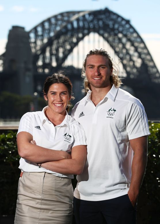 Rugby Sevens player Charlotte Caslick and her partner Lewis Holland pose  for a photograph at the 