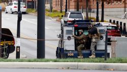 Members of the Columbus SWAT team work the scene around a parking garage after reports of a shooting on the campus of Ohio State University on Monday, Nov. 28, 2016, in Columbus, Ohio. (AP Photo/Jay LaPrete)