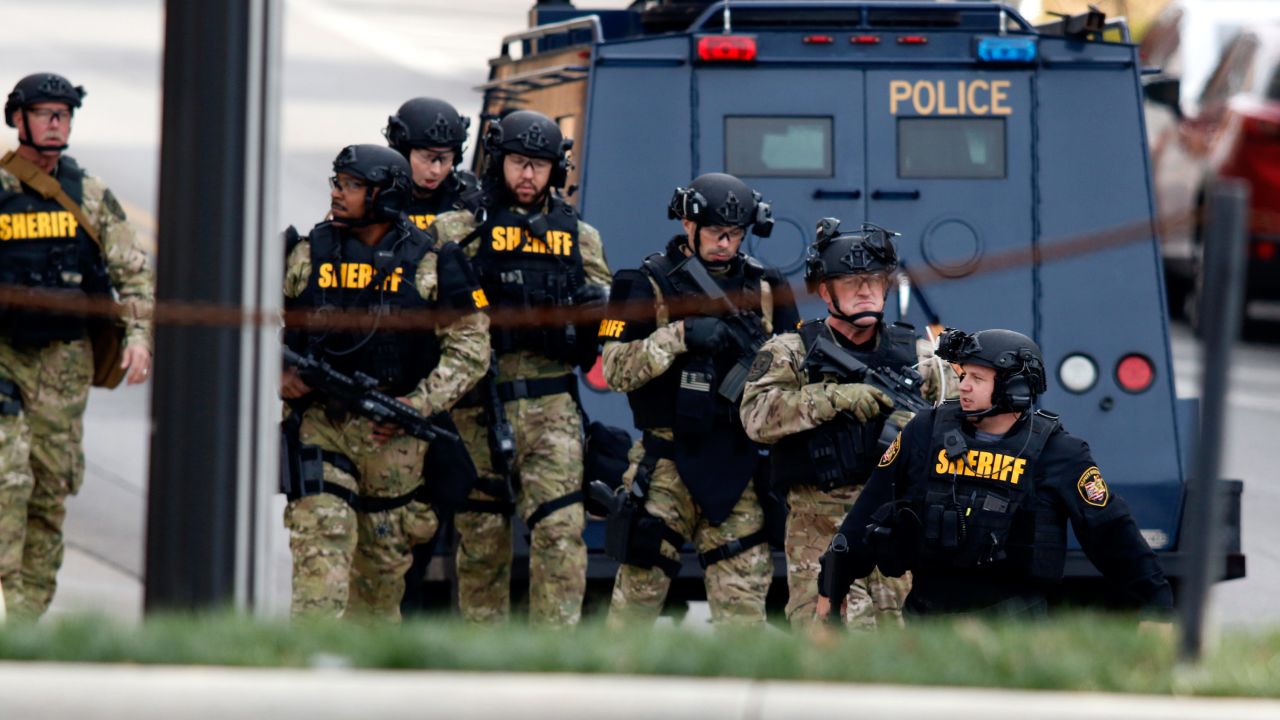 Law enforcement officials are seen outside of a parking garage on the campus of Ohio State University as they respond to an active attack in Columbus, Ohio, on November 28, 2016.
Eight people were injured when an attacker apparently drove into a crowd at Ohio State University on Monday, triggering an hours-long lockdown before authorities declared the campus secure. Law enforcement shot and killed one suspect, according to local television station WBNS, which reported that police led two people out in handcuffs from a garage they had surrounded on the university's main campus in Columbus.


 / AFP / Paul Vernon        (Photo credit should read PAUL VERNON/AFP/Getty Images)