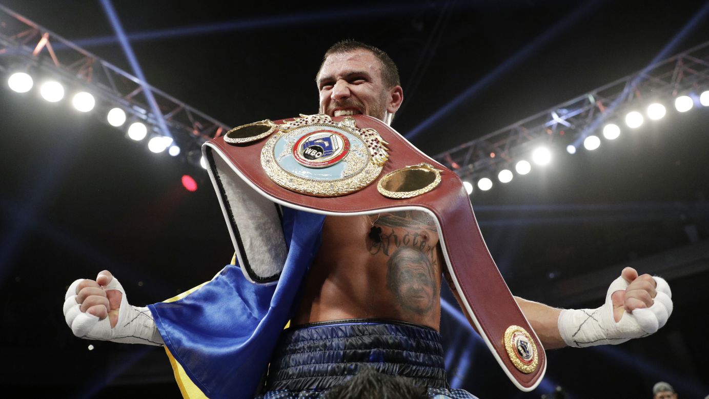 Vasyl Lomachenko celebrates after he successfully defended his junior-lightweight title against Nicholas Walters on Saturday, November 26. The fight in Las Vegas was stopped after the seventh round.