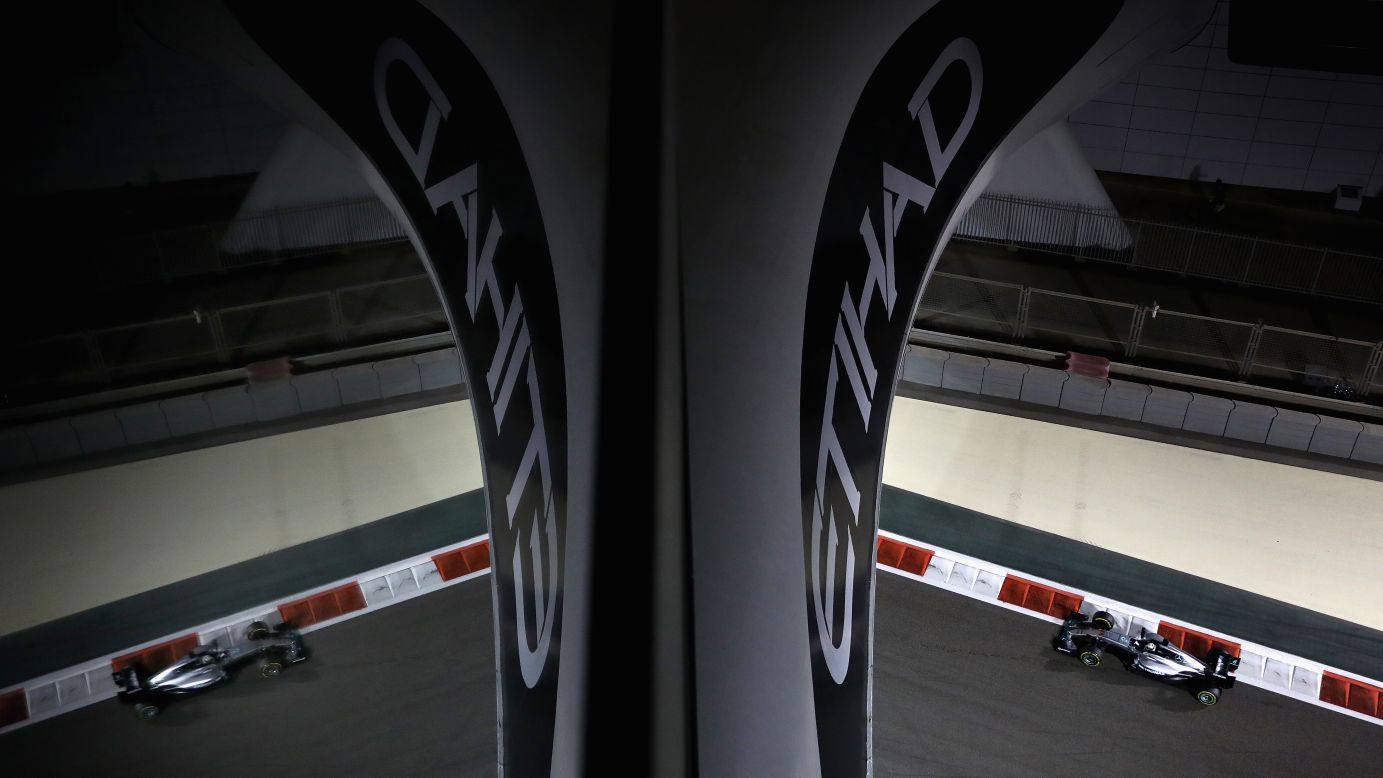 The car of Formula One driver Lewis Hamilton is reflected during a practice run in Abu Dhabi, United Arab Emirates, on Friday, November 25.