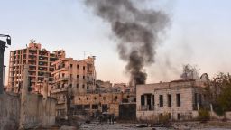 Smoke billows in Aleppo's Bustan al-Basha neighbourhood on November 28, 2016, during Syrian pro-government forces assault to retake the entire northern city from rebel fighters.
Government forces have retaken a third of rebel-held territory in Aleppo, forcing nearly 10,000 civilians to flee as they pressed their offensive to retake Syria's second city. In a major breakthrough in the push to retake the whole city, regime forces captured six rebel-held districts of eastern Aleppo over the weekend, including Masaken Hanano, the biggest of those in eastern Aleppo.