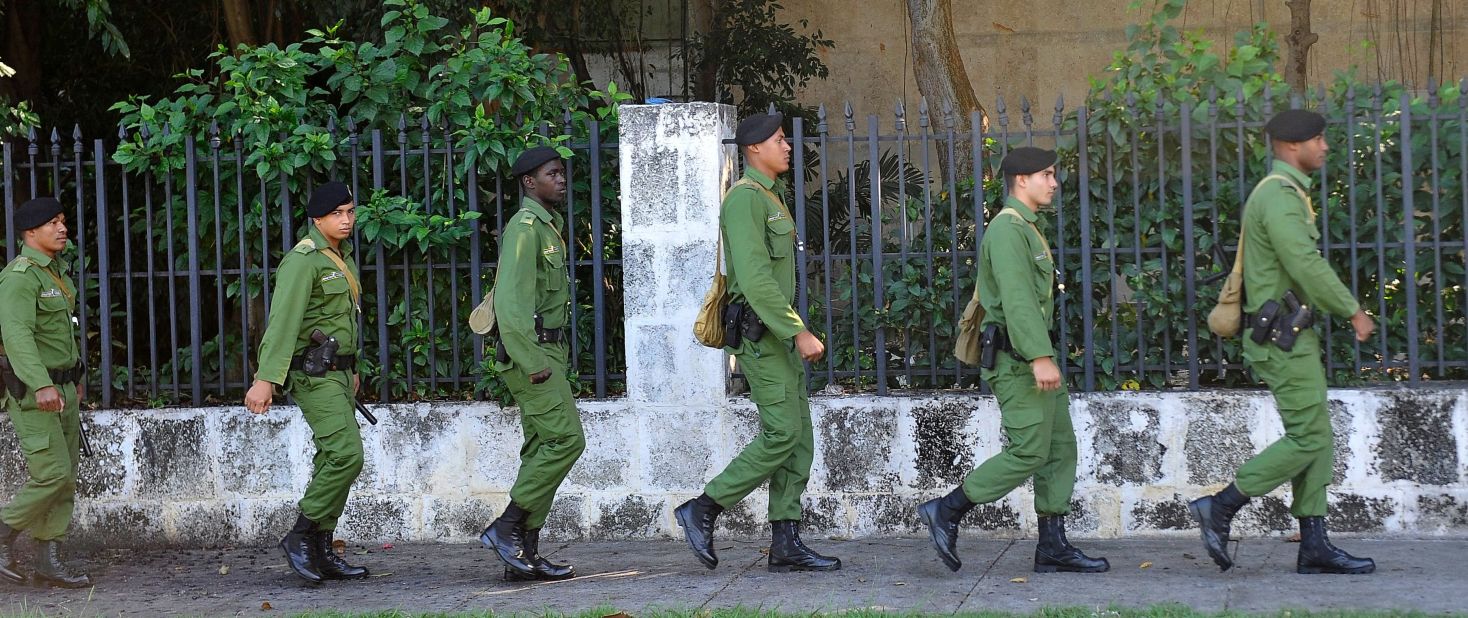 Cuban soldiers march near Revolution Square on November 28. 
