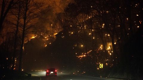Fires burn on both sides of Highway 441 between Gatlinburg and Pigeon Forge on Monday, November 28. 