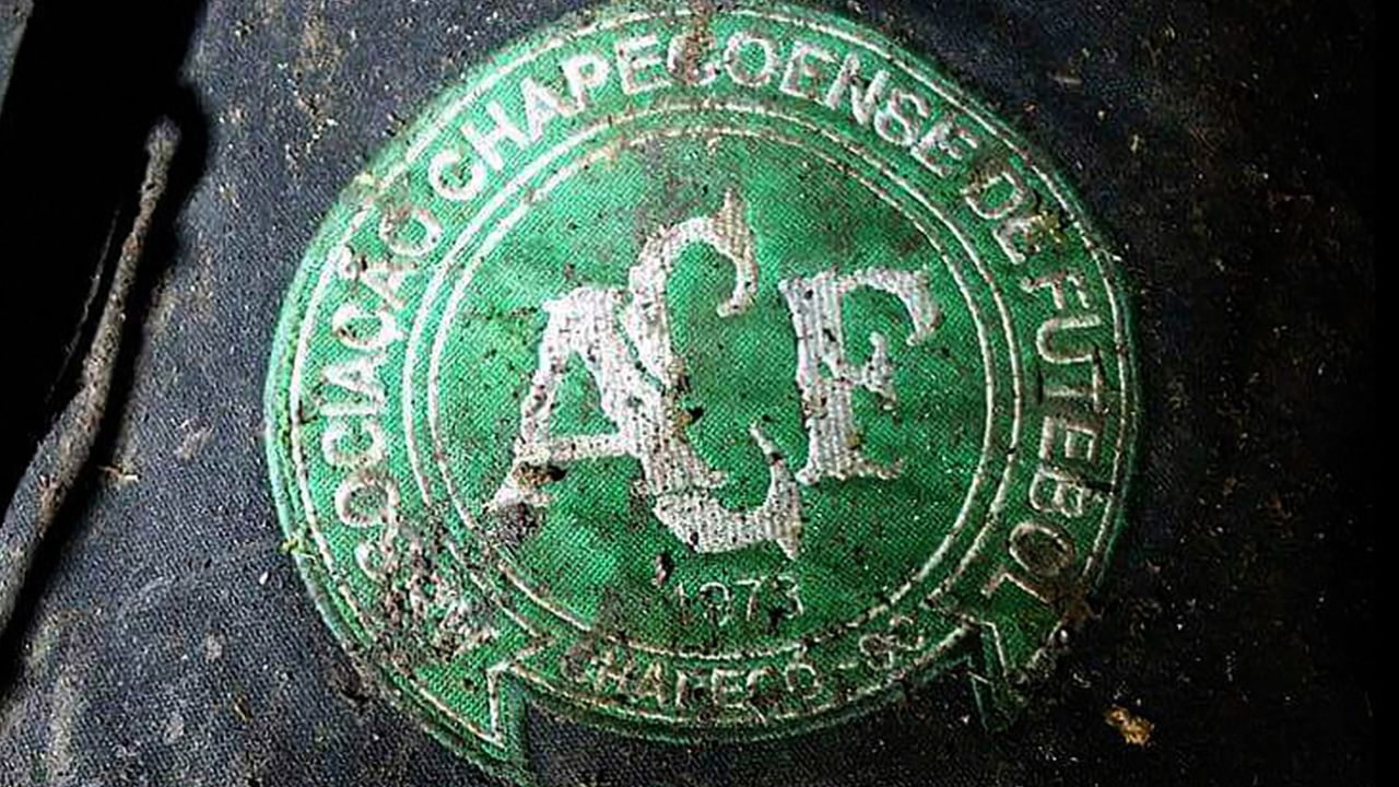 A logo of Brazilian soccer team Chapecoense is found at the site of the plane crash.