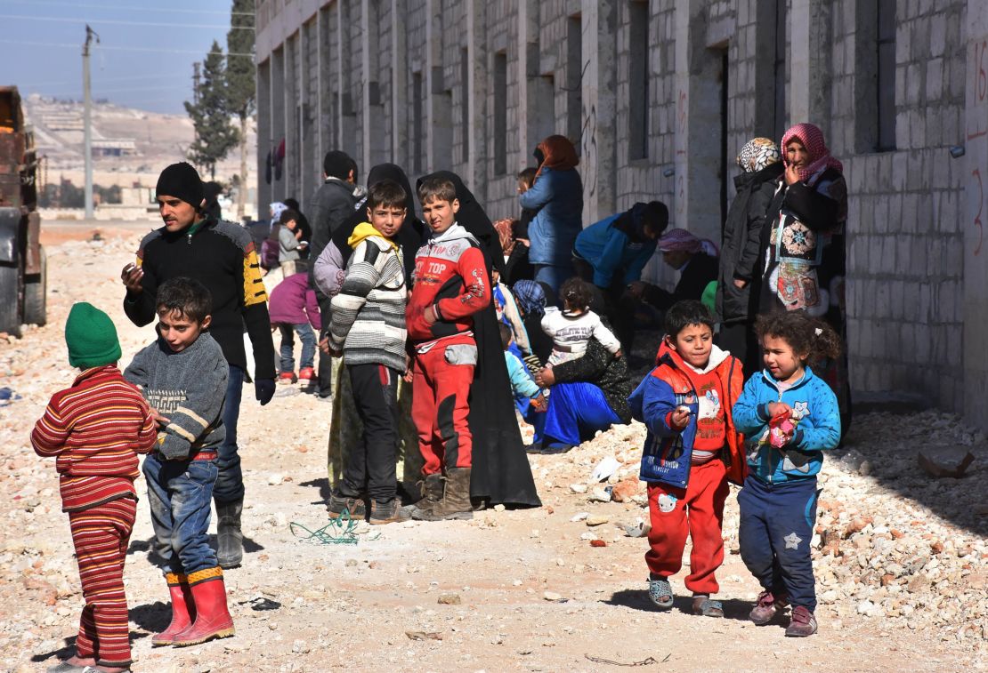 Syrian children displaced from their eastern Aleppo homes at a makeshift camp on Sunday in the government-held district of Jibreen.
