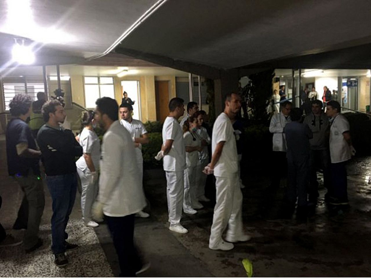 Medical staff wait for survivors in La Ceja.